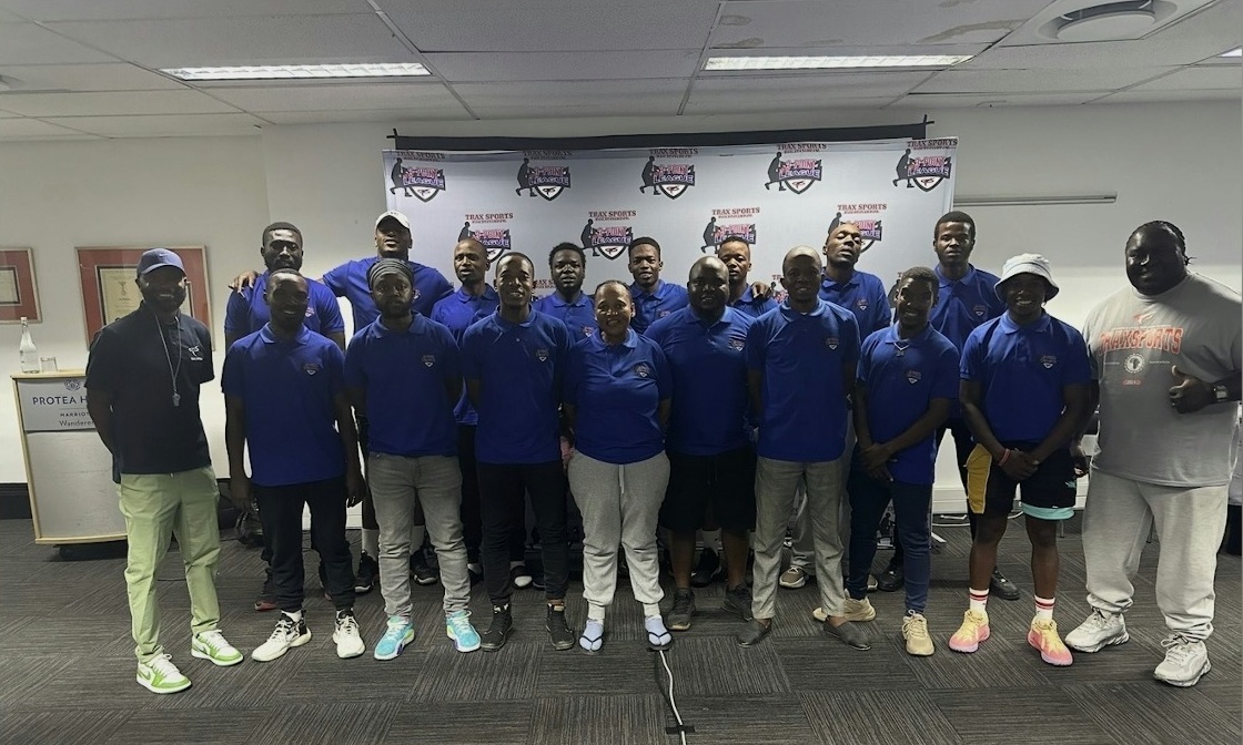 Trax Sports coaches gathered in South Africa in front of a 3-Point League backdrop